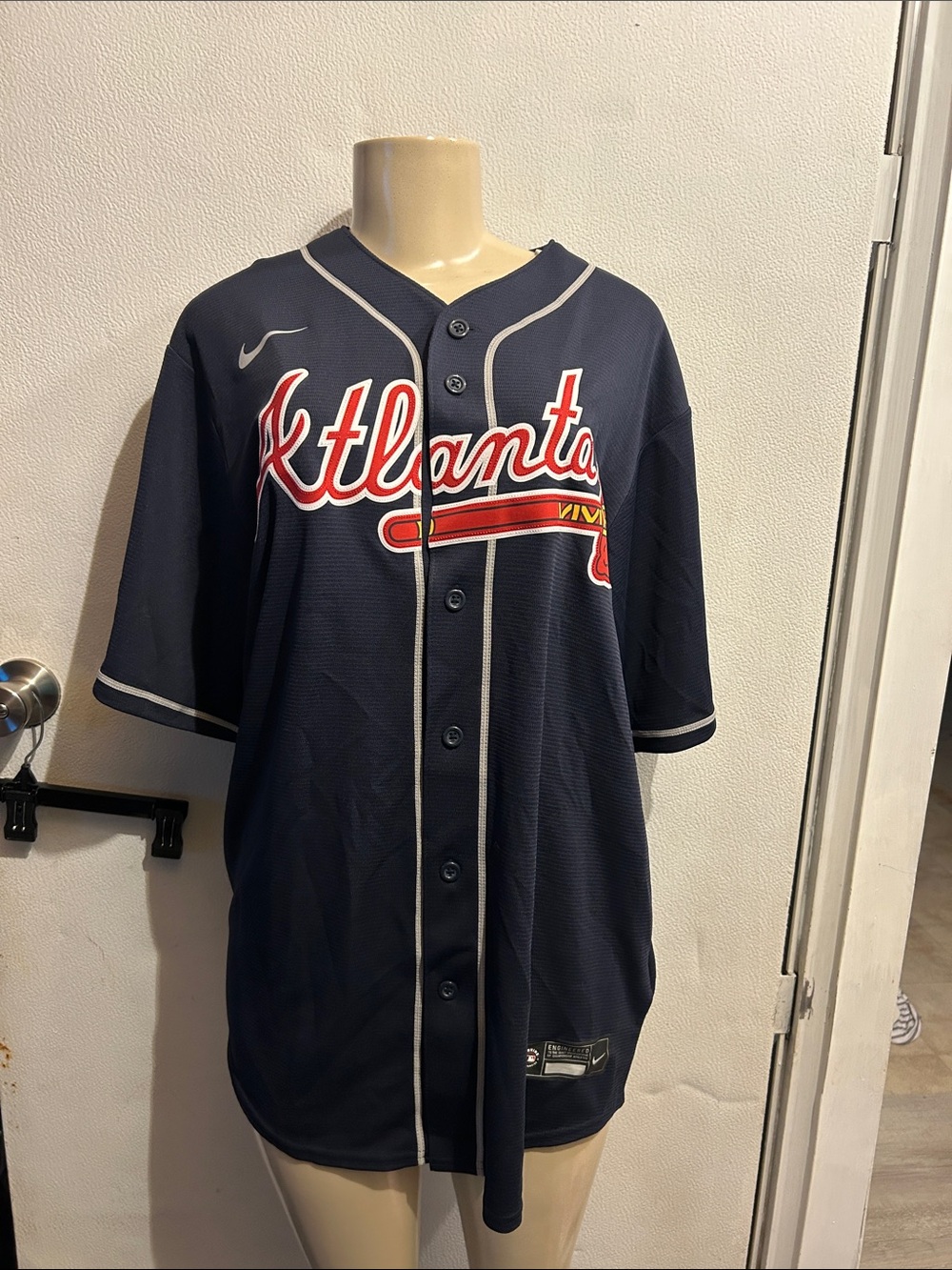 Nike Atlanta Braves Navy Baseball Jersey with Red and White Script